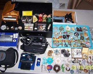 Cameras, jewelry, music  box, etc...