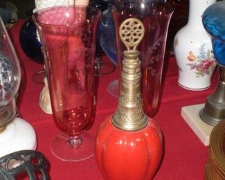 pottery and brass decanter
