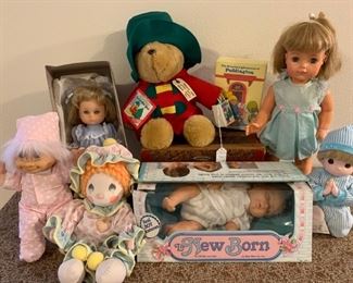 Assorted dolls and toys. 