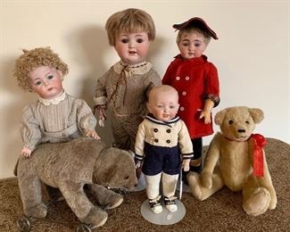 Selection of German boy dolls and bears. 