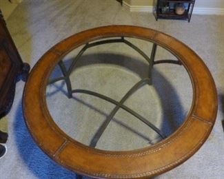 42" round, leather-wrapped wrought iron round coffee table with glass top. 