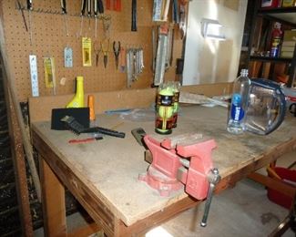 more tools and a vice too! The work bench for sale  if it is not nailed into the wall!