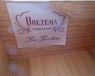 Here is the makers name "Doezema" This label is located inside the top drawer.