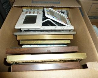Bunch of picture frames,All different sizes.