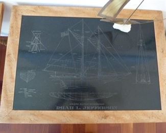 Cool looking ship etchings on each table.
