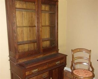 Secretary Bookcas, burl walnut and declicate carved leaf motif