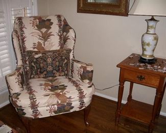 One of a pair of upholstered chairs