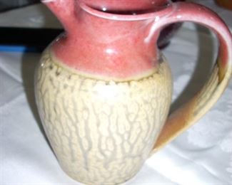 D. K. Clay pottery pitcher