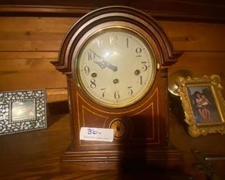 $18.  SMALL BLACK FOREST CLOCK