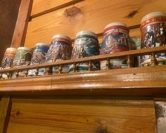 $10./ITEM      COLLECTIBLE BEER STEINS (MOSTLY BUDWEISER AND NUMBERED  ON BOTTOM) (ABOUT 90 LEFT)