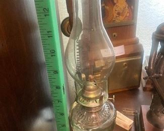 $6.    SMALL GLASS OIL LAMP