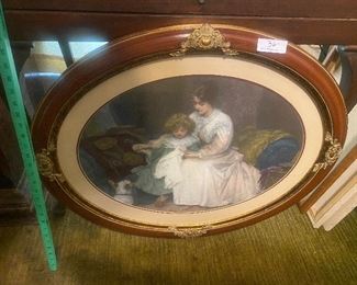 $18.   OVAL MOTHER/DAUGHTER FRAMED PICTURE