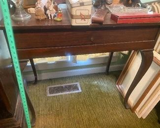 $22.  WOODEN TABLE W/ DRAWER