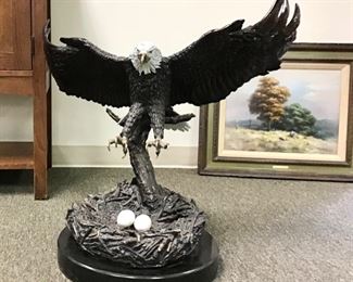 Eagles nest by Donna Hunter. Impressive bronze sculpture. Handcrafted and mounted on marble base. 23 inch wingspan 21 inches tall. Certificate of Authenticity included.