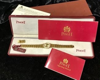 Piaget - 18KT, diamond bezel, diamond hour stops. Will require service through Piaget. Extra links. Appears to never have been worn.