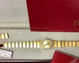 Piaget - 18KT, diamond bezel, diamond hour stops. Will require service through Piaget. Extra links. Appears to never have been worn.