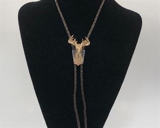Bolo - 14KT Buck with marquis cut diamond eyes.