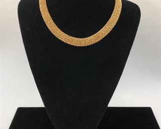 Coordinating basket weave jewelry. Choker, bracelet, and earrings. Not by the same designer, but coordinates well.