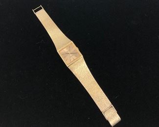 18KT Rolex Cellini winding watch. Keeps accurate time.