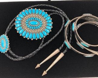 Lorraine Waatsa, Zuni jewelry artist featured published in “Zuni Jewelry” for her cluster work. Fox Mine turquoise buckle, turquoise bolo, turquoise hat band all set in sterling silver