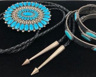 Lorraine Waatsa, Zuni jewelry artist featured published in “Zuni Jewelry” for her cluster work. Fox Mine turquoise buckle, turquoise bolo, turquoise hat band all set in sterling silver