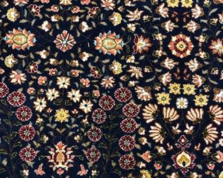 Hereke 6x9 wool and silk Turkish rug.
