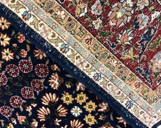 Hereke 6x9 wool and silk Turkish rug.