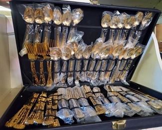Gilded Silverware With Black Case With Latch