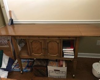 Vintage Buffet sideboard has drop leaf ends