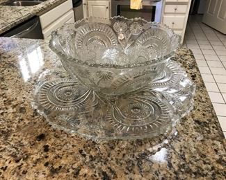 Early American pressed glass punch bowl set and very large tray.
" Slewed horse shoe."