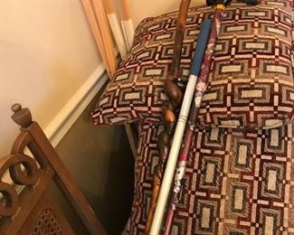 More pickers items in garage. Canes and odd chairs