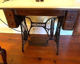 antique Singer sewing machine table with marble top