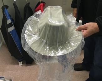 . . . this Stetson has never been used -- in original plastic and box.
