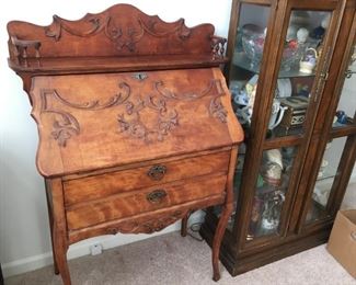 . . . a beautiful drop-leaf desk with great carved appliques.