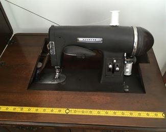 . . . this is the vintage Kenmore sewing machine inside that beautiful cabinet.
