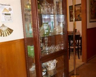 Lighted Curio Cabinet full of Glass and Porcelain