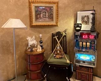 Mid Century floor lamp
Unique side table
Vintage swords
Pinball machine