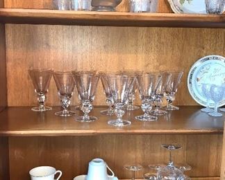 Vintage pitcher with four glasses, beautiful crystal wine glasses, and luncheon set of dishes