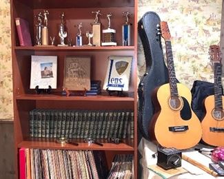 Large standalone bookcase, lots of great trophies, books and albums