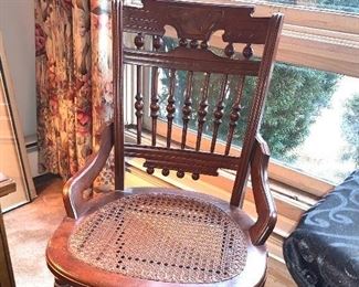 Beautiful Eastlake style vintage chair with cane seat