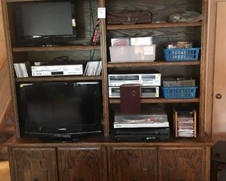 Large oak entertainment center $180
Sharp 21 inch TV $52, 
Samsung 20 inch TV $72, 
Samsung 24 inch TV with mounting bracket $5 Polaroid VHS and DVD combo player $24