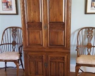 Armoire and captain's chairs