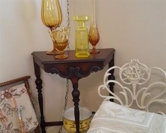 Amber glass, one of several wrought iron chairs, vintage table