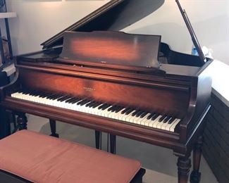 1920’s Brambach of New York Baby Grand Piano in a handsome walnut color..