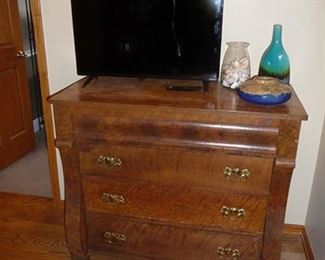 TV and Chest of Drawers