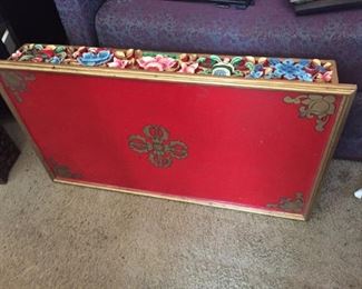 Decorative carved table top.