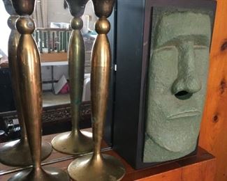 Brass candlesticks and Face Kleenex box.