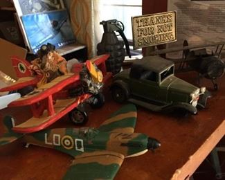 Miniature plans and trucks.