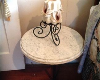 Faux marble top side table, has adjustable base