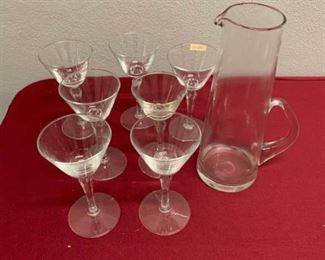 Glass pitcher and seven glasses https://ctbids.com/#!/description/share/337630